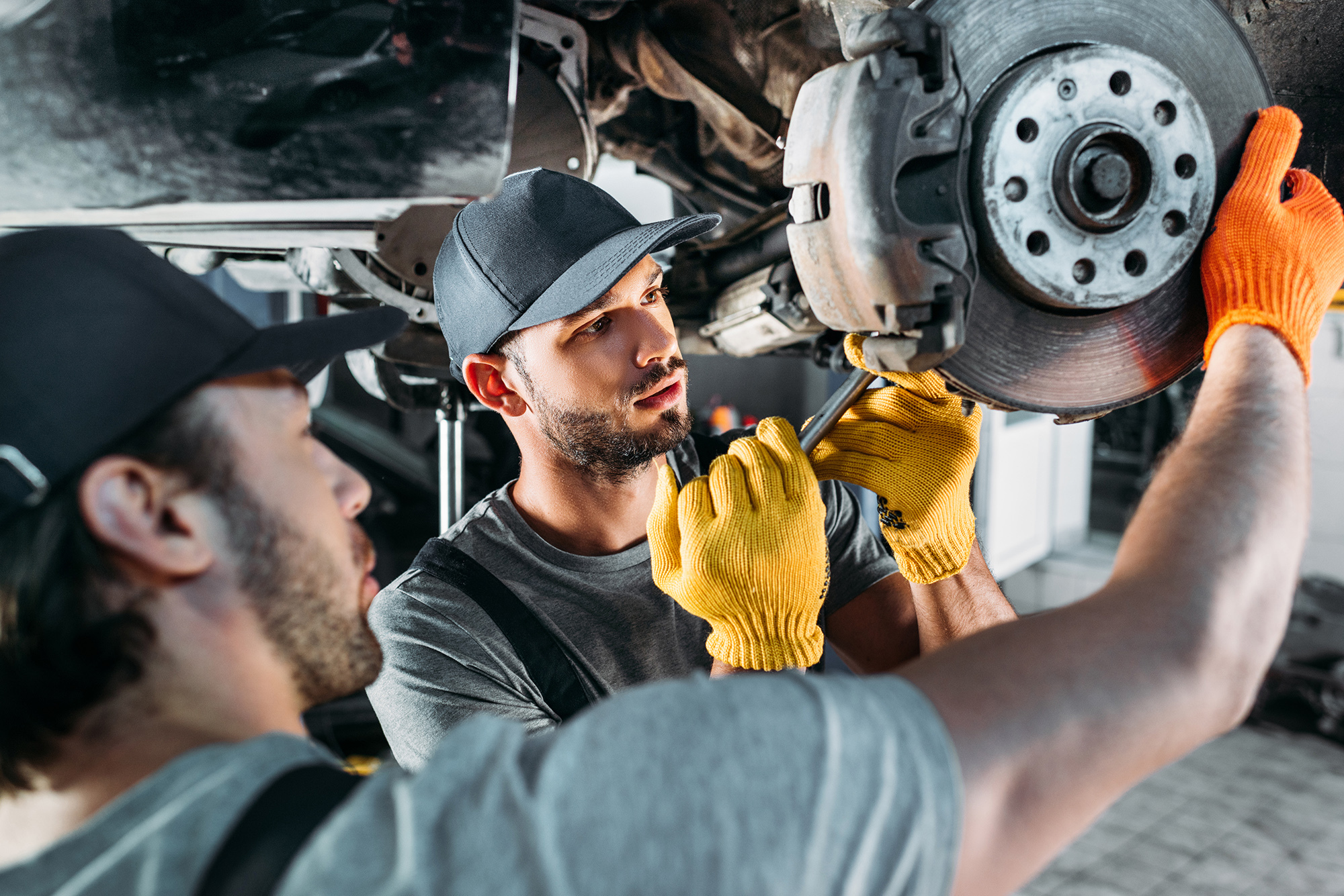 A mechanic working on a Golf R